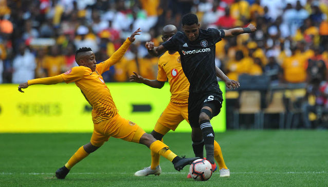 Hendrick Ekstein challenges Vincent Pule for the ball