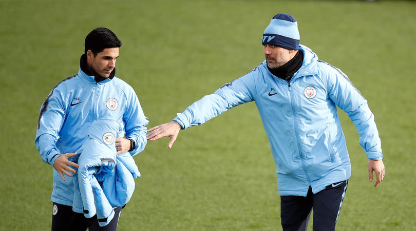 Manchester City manager Pep Guardiola and Mikel Arteta