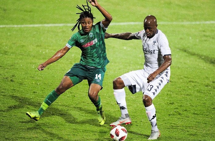 Siyethemba Sithebe of AmaZulu FC and Sifiso Hlanti of Bidvest Wits