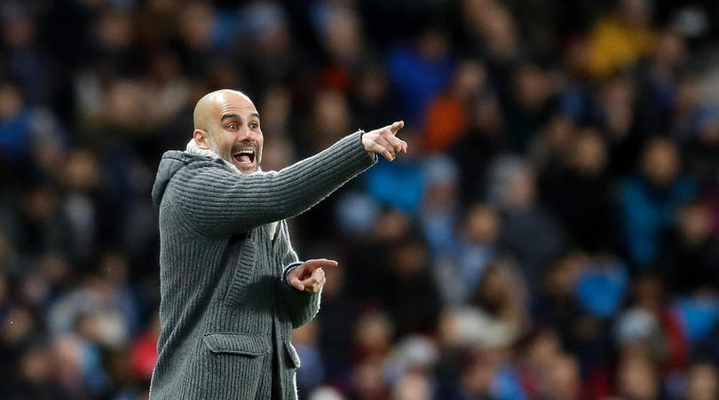 Manchester City manager Pep Guardiola on the touchline