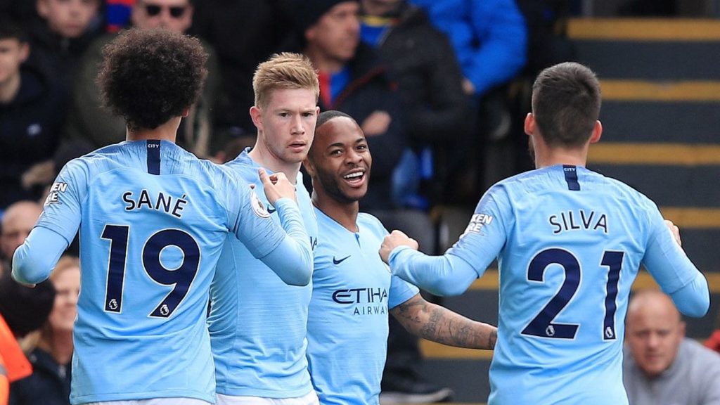 Sterling brace sends Man City top