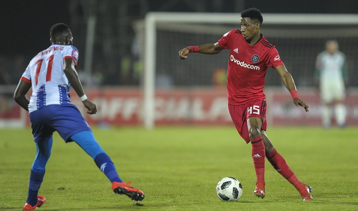 Vincent Pule of Orlando Pirates takes on Fortune Makaringe of Maritzburg United