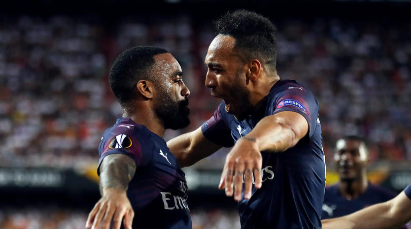 Arsenal's Pierre-Emerick Aubameyang celebrates with teammate Alexandre Lacazette