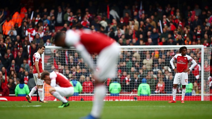 Arsenal players react at the end knowing their chances of making the top-four are now unlikely