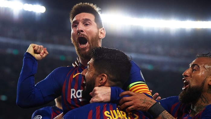 Lionel Messi celebrates with his Barcelona teammates