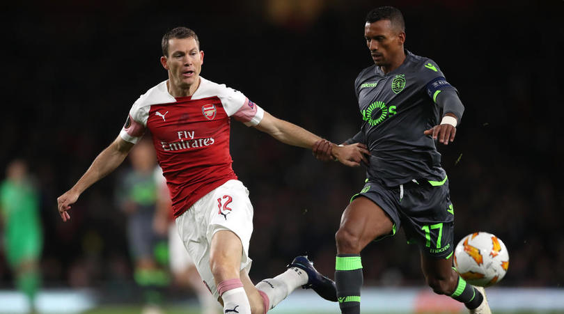 Stephan Lichtsteiner of Arsenal and Sporting Lisbon's Luis Nani