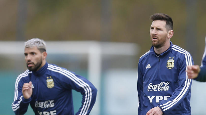 Argentina's player Sergio Aguero and Lionel Messi