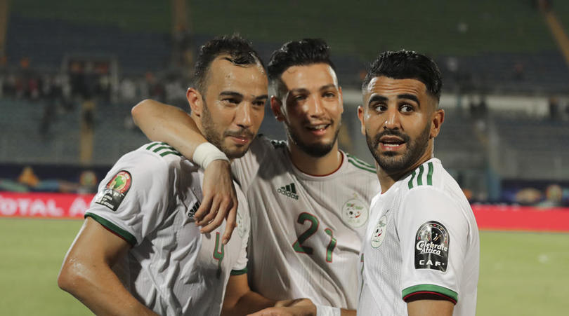 Algerian players celebrate after securing their Afcon progression