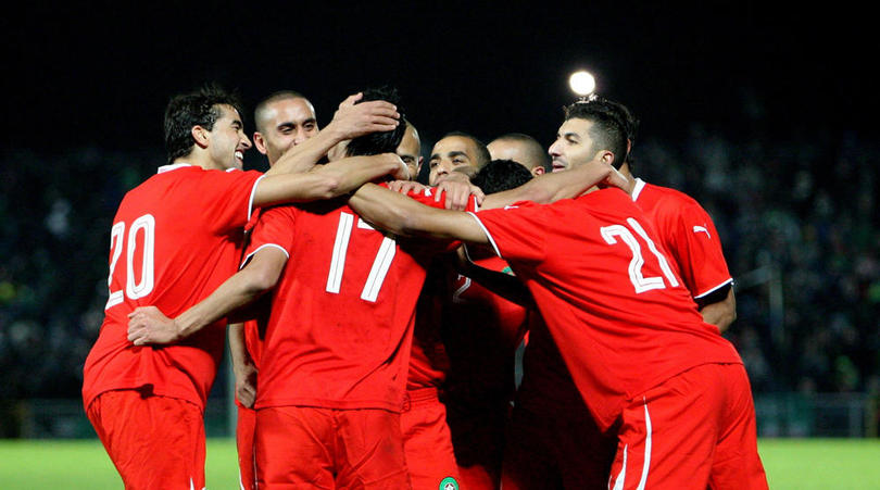 The Moroccan players celebrate