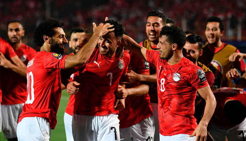 Egypt celebrate the winner against Zimbabwe