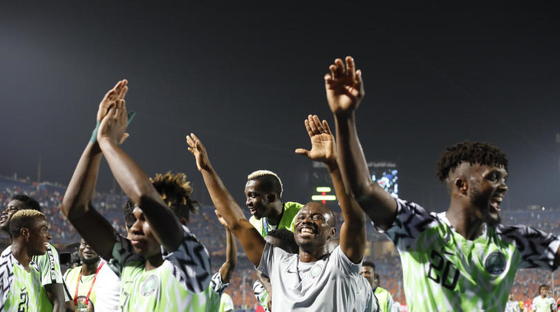 Nigerian players celebrate after to progressing to the Afcon semis