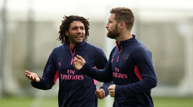 Arsenal's Mohamed Elneny (left) and Shkodran Mustafi during the training session at London Colney, Hertfordshire.