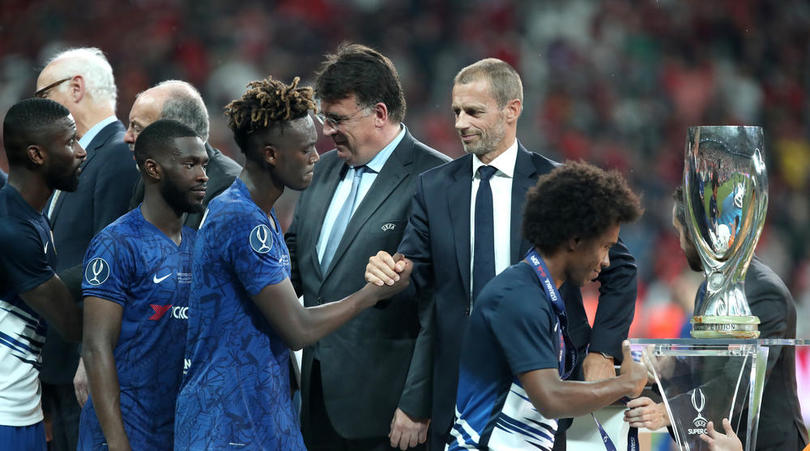 Chelsea's Tammy Abraham shakes hands with UEFA Chairman Aleksander Ceferin during the UEFA Super Cup Final at Besiktas Park, Istanbul.