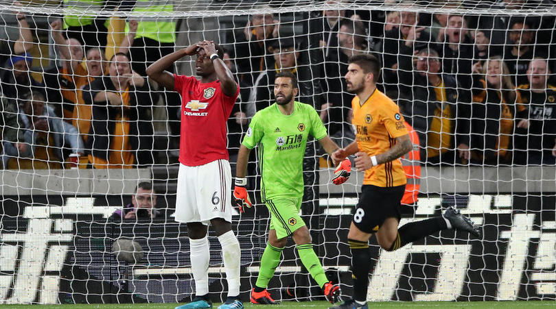 Manchester United's Paul Pogba reacts after a penalty saves from Wolverhampton Wanderers goalkeeper Rui Patricio during the Premier League match at Molineux, Wolverhampton.