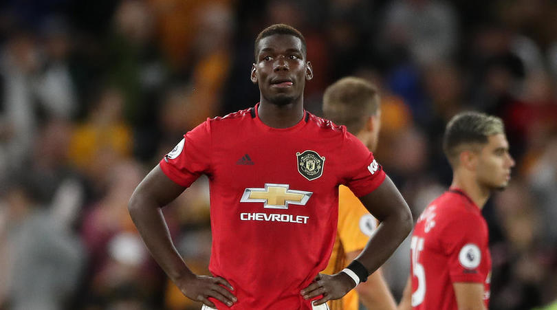 Manchester United's Paul Pogba looks dejected after the Premier League match at Molineux, Wolverhampton.