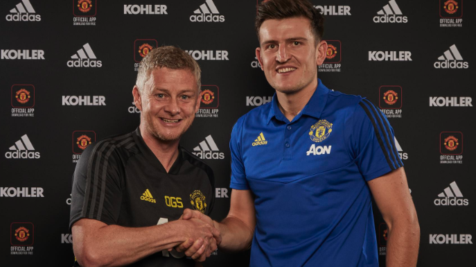 Ole Gunnar Solskjaer with Harry Maguire after becoming the most expensive Premier League signing of the window