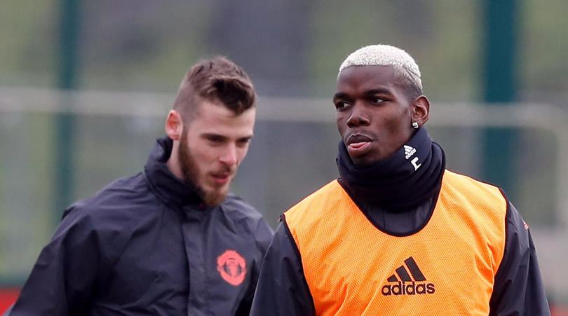 Manchester United's Paul Pogba and goalkeeper David De Gea