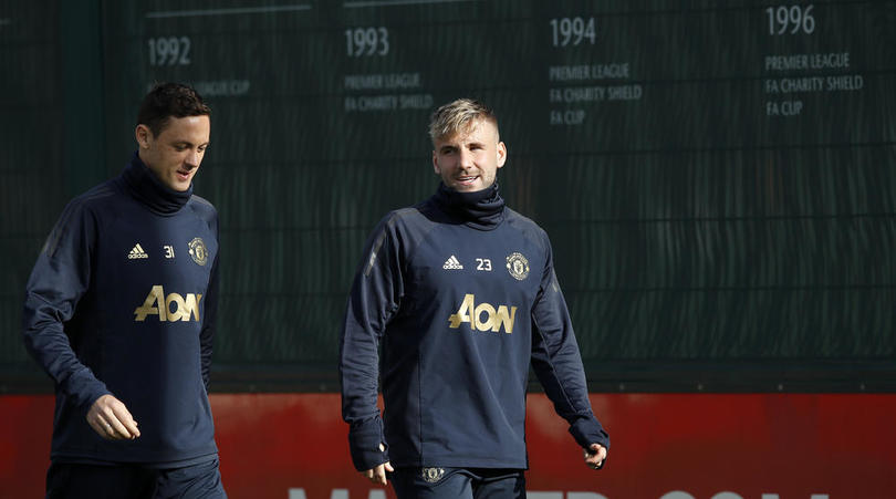 Manchester United's Nemanja Matic (left) and Luke Shaw during the training session at the Aon Training Complex, Manchester.