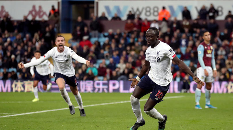 Liverpool's Sadio Mane celebrates scoring his side's second goal of the game during the Premier League match at Villa Park, Birmingham.