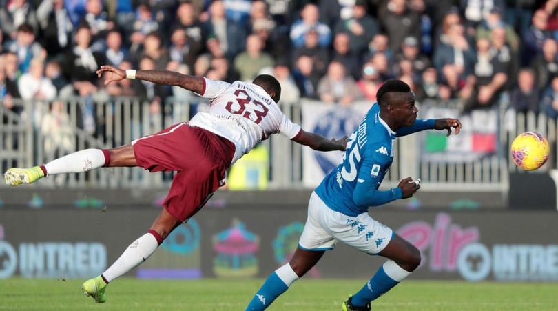 Brescia's Mario Balotelli and Torino's Nicolas N'Koulou