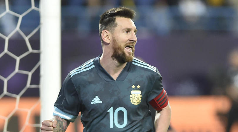 Argentina's Lionel Messi celebrates after scoring his side's opening goal during a friendly soccer match against Brazil