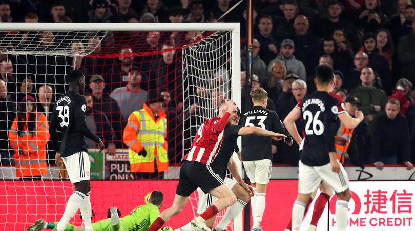 Sheffield United's Oliver McBurnie celebrates scoring his side's third goal against Manchester United