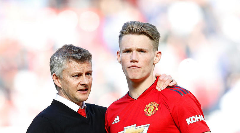 Manchester United manager Ole Gunnar Solskjaer with Scott McTominay