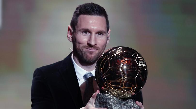 Barcelona's Lionel Messi with the Ballon d'Or