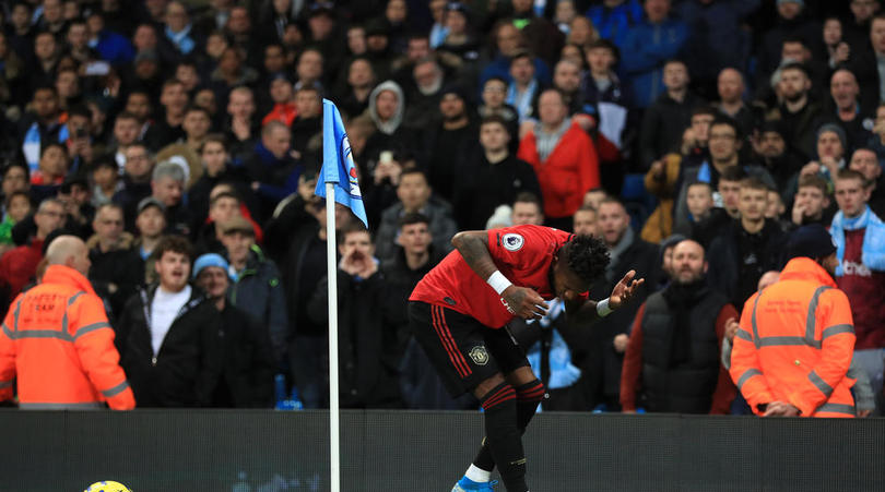 Manchester United's Fred reacts after objects are thrown at him during the Premier League match at the Etihad Stadium, Manchester.