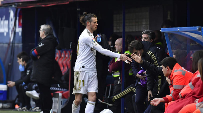 Real Madrid's Gareth Bale walks out of the pitch after being substituted during the Spanish La Liga soccer match between Osasuna and Real Madrid at El Sadar stadium in Pamplona, northern Spain, Sunday, Feb. 9, 2020. (AP Photo/Alvaro Barrientos)