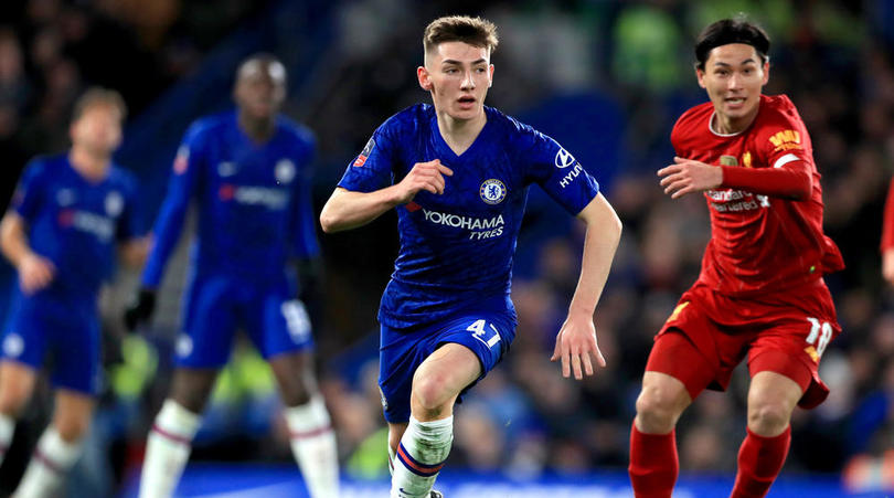 Chelsea's Billy Gilmour controls the ball away from Liverpool's Takumi Minamino (right) during the FA Cup fifth round match at Stamford Bridge, London.