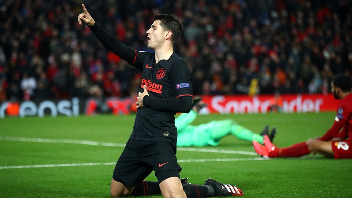 Alvaro Morata of Atletico Madrid celebrates after scoring his team's third goal during the UEFA Champions League round of 16 second leg match between Liverpool FC and Atletico Madrid