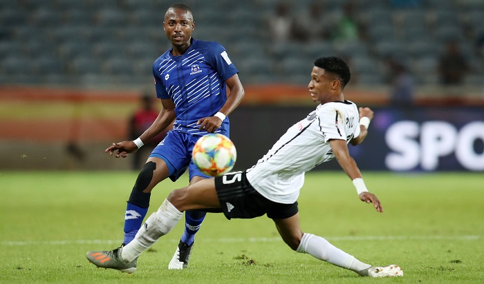 Bandile Shandu of Maritzburg United challenged by Vincent Pule of Orlando Pirates